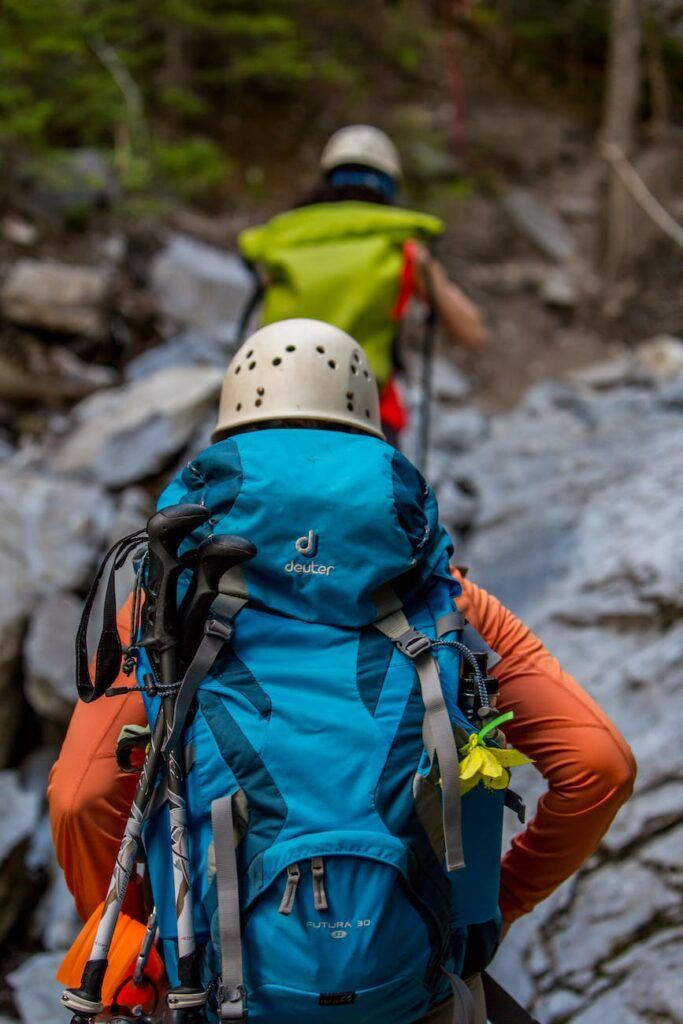 Two hikers carrying the 10 essentials